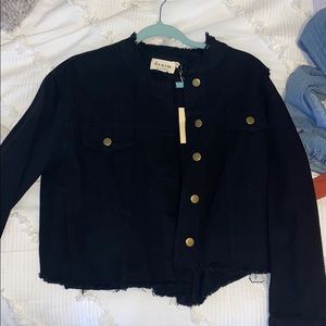 Black jean jacket with tags